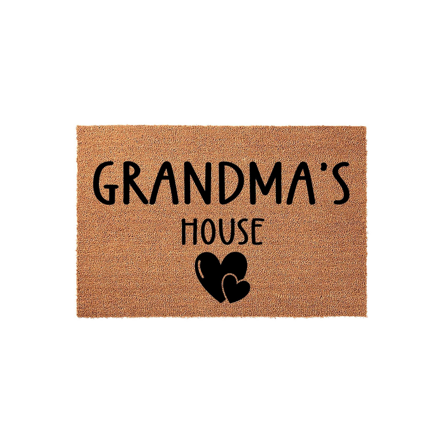 Grandma's House coir doormat featuring a natural tan fiber texture with bold black lettering and two simple heart icons, creating a welcoming entryway decor piece for a grandparent's home on a clean white background.