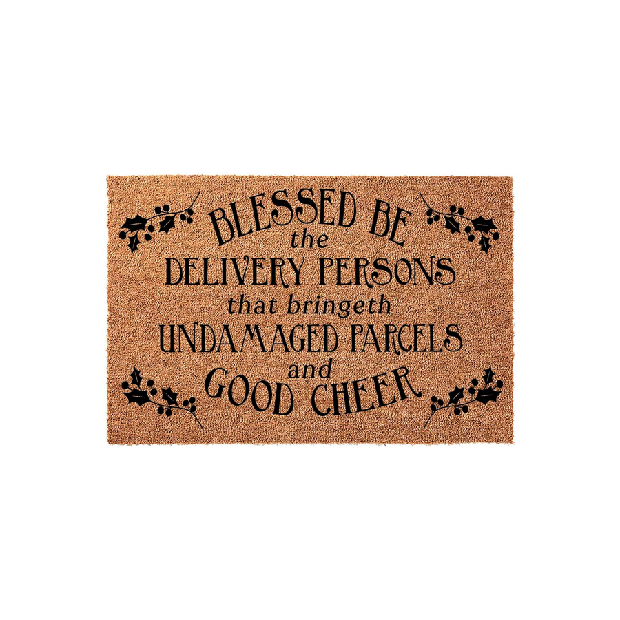 Funny Holiday Delivery Person Doormat featuring natural coir fibers and black text that reads Blessed Be the Delivery Persons that bringeth Undamaged Parcels and Good Cheer, accented with festive holly leaf and berry