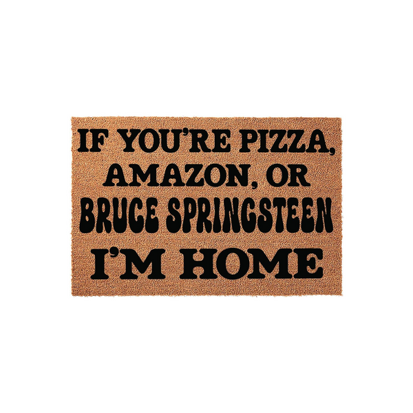 Funny Welcome Doormat featuring bold black text on a natural coir fiber background that reads If You Are Pizza, Amazon, Or Bruce Springsteen I Am Home, making it a humorous front porch decor piece for music fans and home delivery