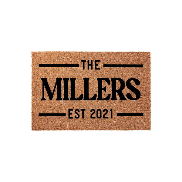 Personalized family name coir doormat featuring a natural tan fiber texture with bold black text that reads The Millers and includes an established date, creating a classic and welcoming entrance decor piece for any front porch