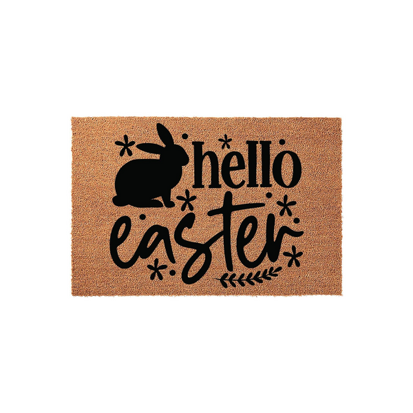 Hello Easter bunny coir doormat featuring a natural tan fiber texture with a bold black silhouette of a rabbit and festive floral accents, creating a charming seasonal welcome for your front porch decor during the spring holiday