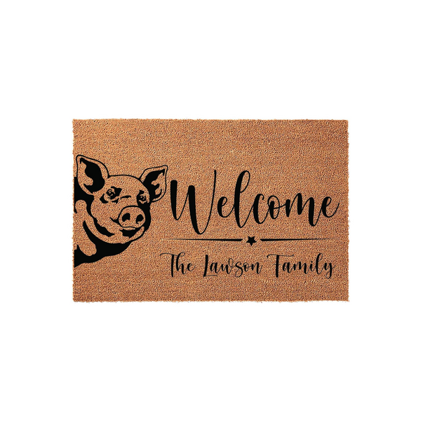 Personalized Pig Welcome Doormat featuring a cute farm animal illustration on the left side, with the word Welcome and a custom family name printed in elegant black script on a natural tan coir fiber background for a rustic home