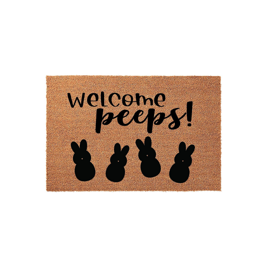 Easter Welcome Peeps coir doormat featuring a natural brown fiber texture with black text that reads Welcome peeps! and four simple black bunny silhouettes lined up across the bottom for a festive spring porch decor entryway