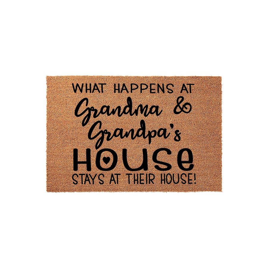 Grandma and Grandpa coir doormat featuring the playful text What Happens at Grandma and Grandpa's House Stays at Their House, printed in a mix of bold and script black fonts on a natural brown textured fiber background.