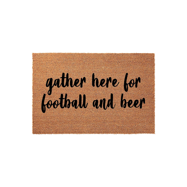 Football and beer coir doormat featuring the phrase gather here for football and beer in bold black script lettering, set against a natural tan textured fiber background for a fun and casual entryway decor statement piece.