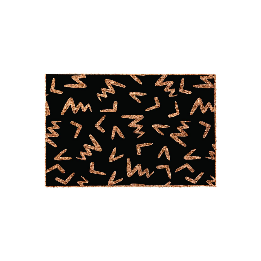 Modern Geometric Pattern Doormat featuring a bold black background with scattered copper-colored zigzag and chevron shapes, creating a stylish and contemporary aesthetic for an entryway or porch floor decor on a plain white