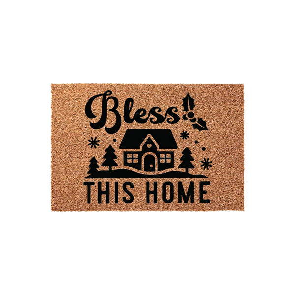 Bless This Home Christmas doormat featuring a natural coir texture with a black printed design of a cozy house, pine trees, snowflakes, and holly leaves, creating a festive winter entryway decor piece for the holiday season.