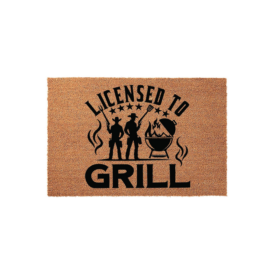 Licensed to Grill coir doormat featuring a black graphic of two cowboys holding grilling tools next to a barbecue pit, set against a natural brown textured fiber background for a fun outdoor patio or backyard kitchen entrance