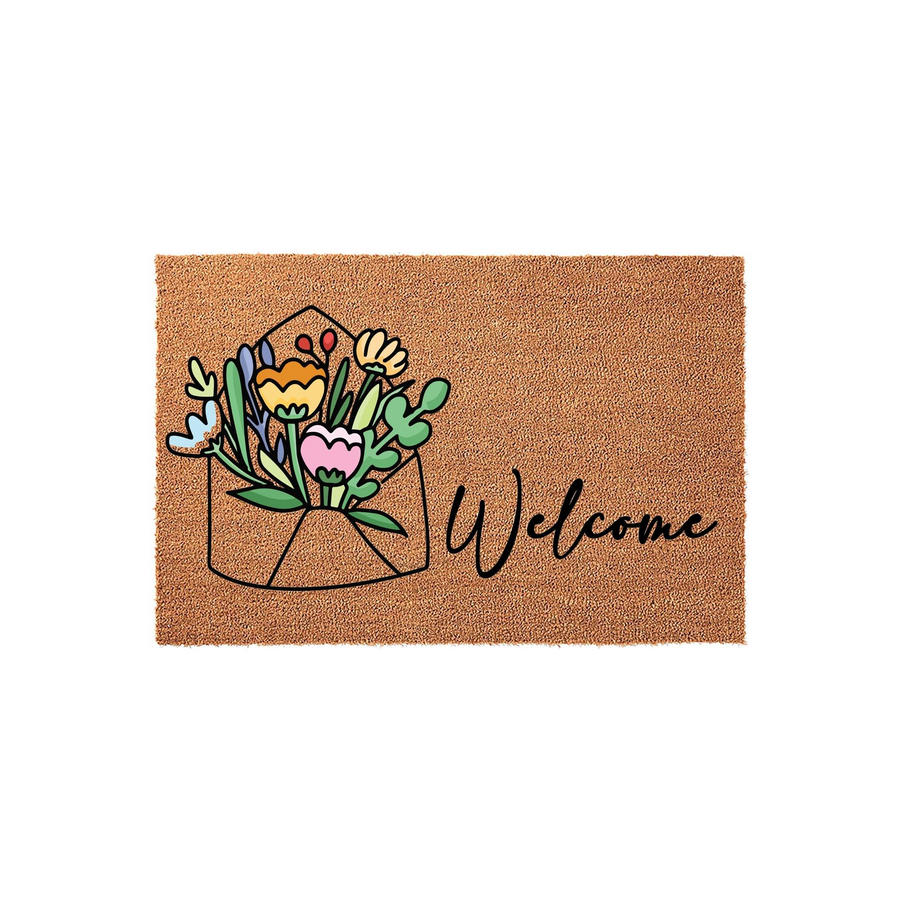 Floral Envelope Welcome Doormat featuring a natural coir texture with a colorful illustration of a bouquet of flowers tucked inside an envelope, accompanied by the word Welcome written in a black cursive script on a plain white