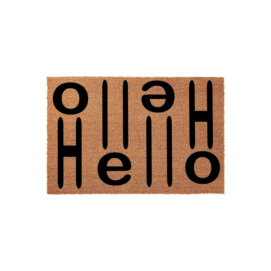 Hello coir doormat featuring a modern, minimalist design with the word hello printed in bold black letters that are rotated vertically against the natural brown textured fiber background of this rectangular outdoor entryway mat.