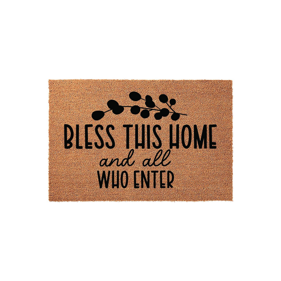 Bless This Home and All Who Enter coir doormat featuring a natural brown fiber texture and black printed text with a decorative eucalyptus branch design, creating a welcoming entryway accent for your front porch or home decor.
