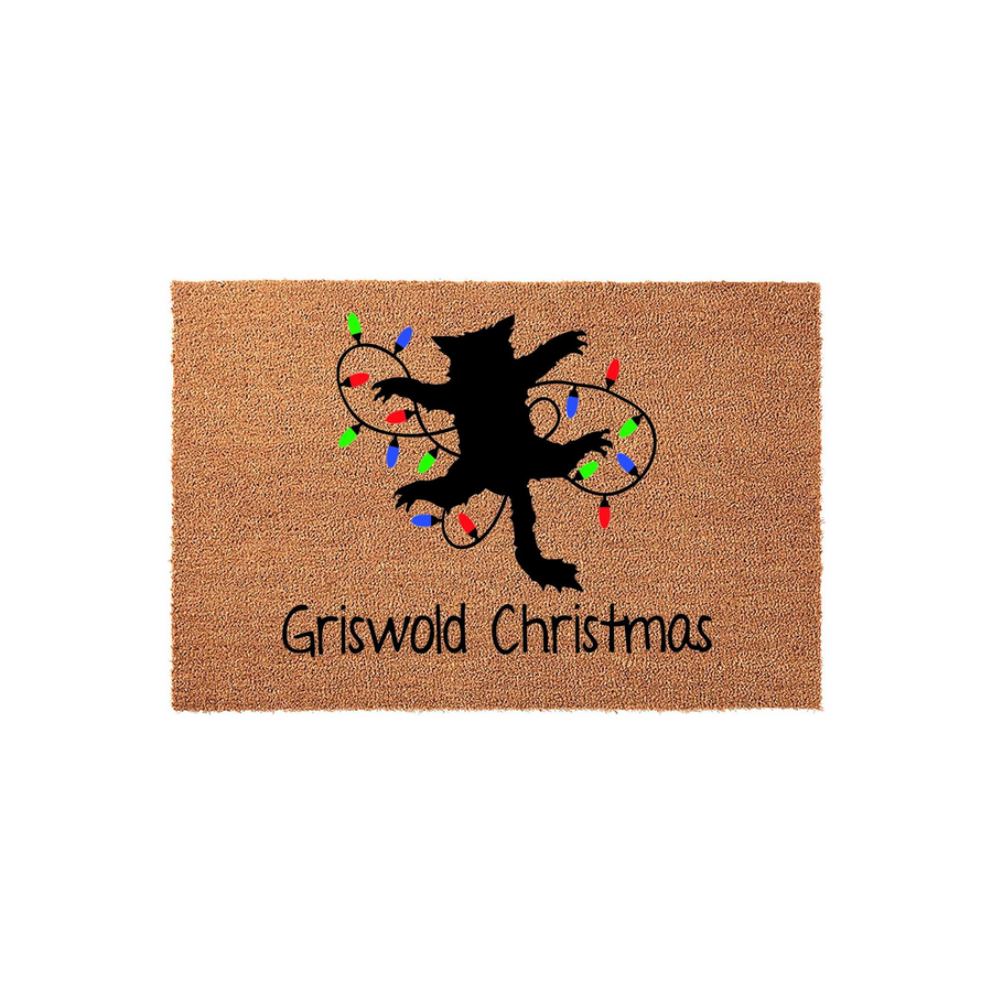 Griswold Christmas cat doormat featuring a black silhouette of a cat tangled in colorful holiday lights on a natural coir background, with the text Griswold Christmas printed in a playful black font at the bottom of the