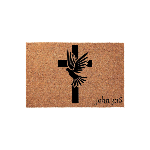 Religious Christian coir doormat featuring a black silhouette of a dove flying in front of a cross, with the scripture reference John 3:16 printed in the bottom right corner on a natural brown textured fiber background for a