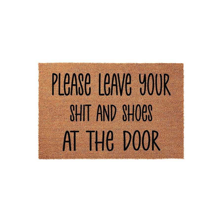 Funny Welcome Doormat with the text Please Leave Your Shit and Shoes at the Door printed in black on a natural brown coir fiber mat, featuring a rectangular shape and a clean, minimalist design for a modern home entryway or porch.