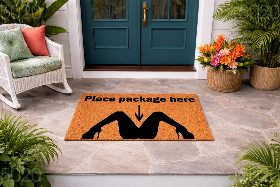 Funny Place Package Here doormat featuring a humorous graphic of legs in high heels, displayed on a stone porch in front of a teal front door with a white wicker chair and potted plants nearby for a welcoming home entryway