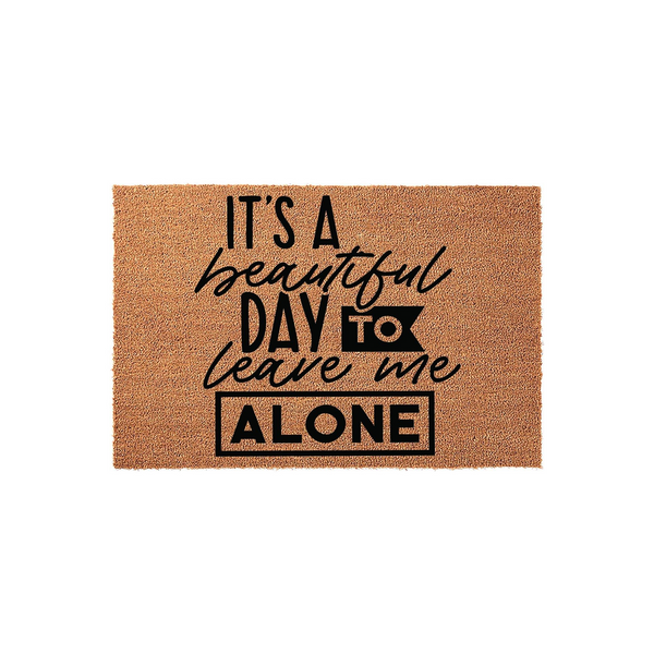 Funny It's a Beautiful Day to Leave Me Alone coir doormat featuring bold black typography on a natural brown coconut fiber background, perfect for adding a humorous and welcoming touch to your front porch or entryway decor.
