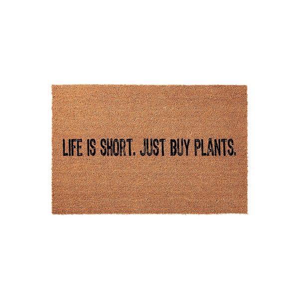 Life is Short Just Buy Plants coir doormat featuring a natural brown fiber texture and bold black lettering, centered on a plain white background to highlight the humorous gardening quote for your front porch entryway decor.