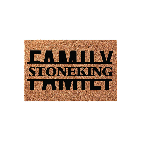 Personalized Family Name Coir Doormat featuring bold black text that reads Family Stoneking Family on a natural brown coconut fiber background, creating a welcoming and durable entrance mat for any home front porch or entryway.