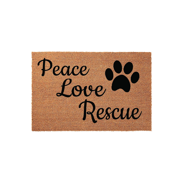 Peace Love Rescue coir doormat featuring a natural brown fiber texture and bold black script lettering, accented by a large paw print icon that celebrates animal adoption and pet lovers in a clean, studio-lit front door entryway