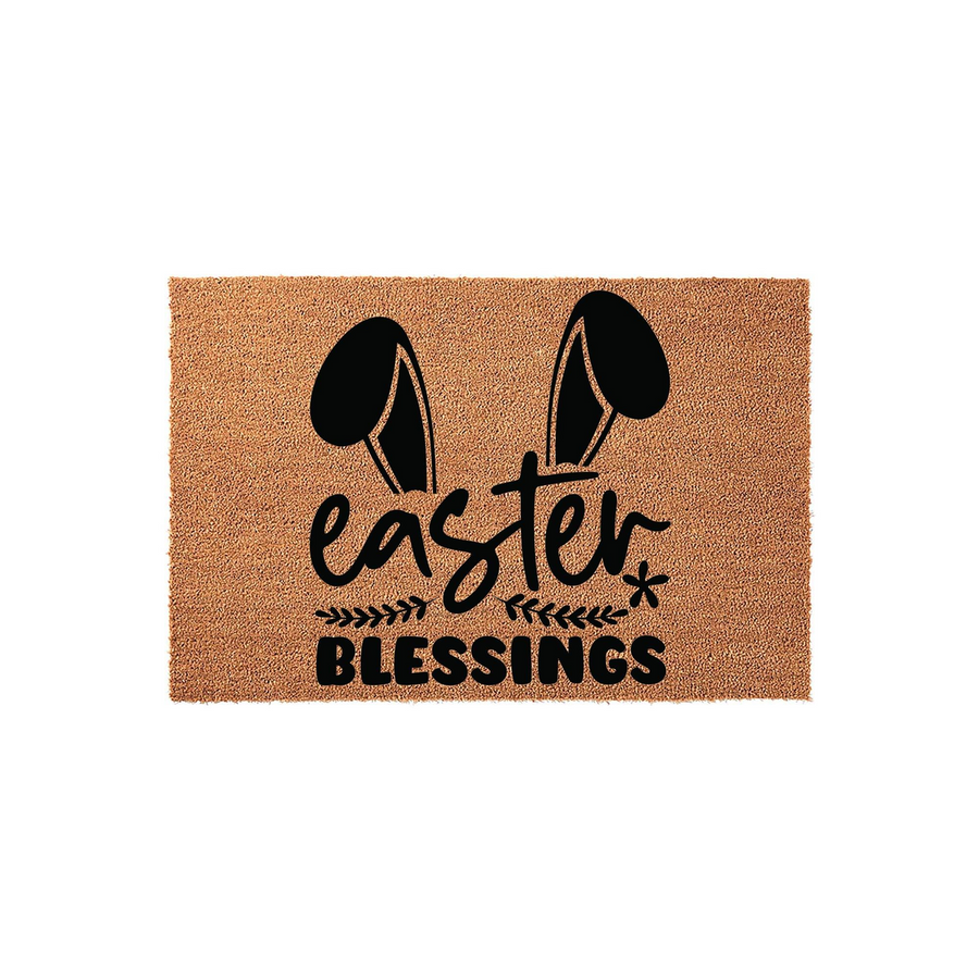 Easter Blessings coir doormat featuring a natural brown fiber texture with black printed bunny ears and festive holiday typography, creating a charming seasonal welcome mat for your front porch decor during the spring season.