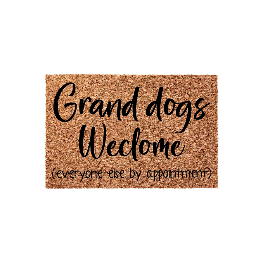 Grand dogs welcome doormat made of natural coir fiber, featuring black script text that reads Grand dogs welcome and everyone else by appointment, set against a clean white background for a humorous entryway decor statement.