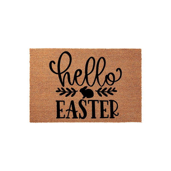 Hello Easter coir doormat featuring a natural brown fiber texture with black printed text and a cute bunny silhouette icon centered between leafy branches, creating a festive spring entryway decor piece for your front porch.