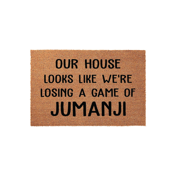 Funny Jumanji quote doormat featuring a natural coir texture and bold black lettering that reads Our House Looks Like We Are Losing A Game Of Jumanji, making it a humorous and welcoming front porch decor piece for any movie fan