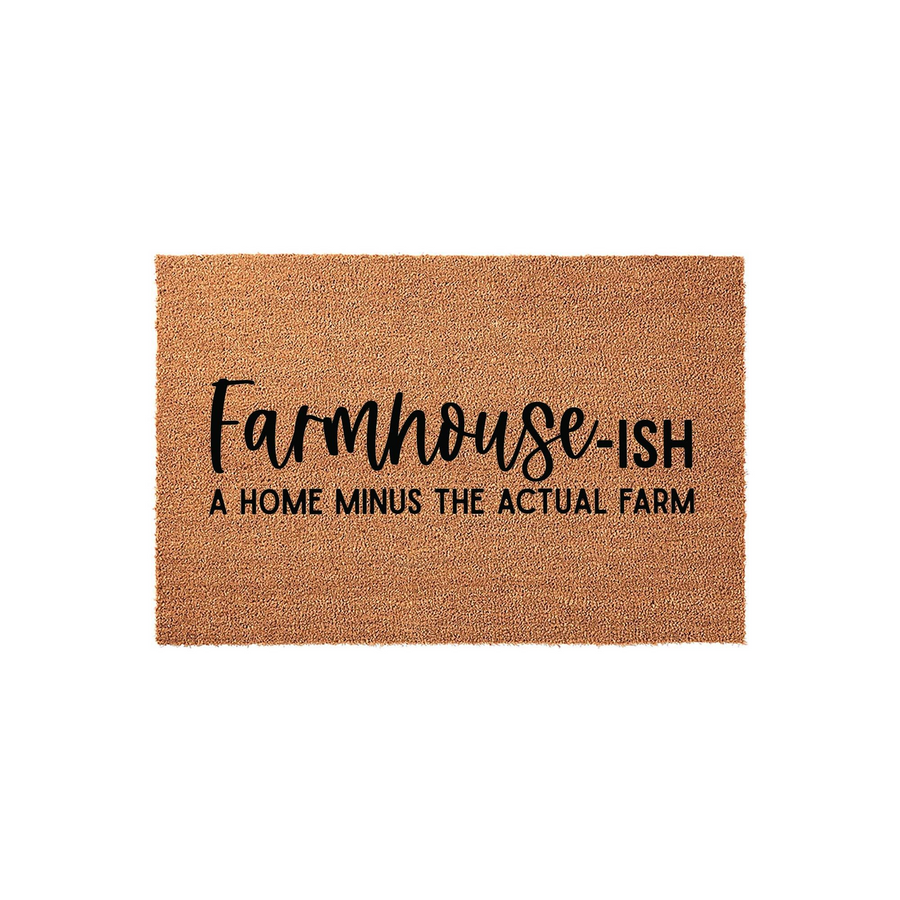Farmhouse-ish coir doormat featuring a natural brown fiber texture and bold black lettering that reads Farmhouse-ish, a home minus the actual farm, making it a humorous and stylish addition to any front porch or entryway decor.