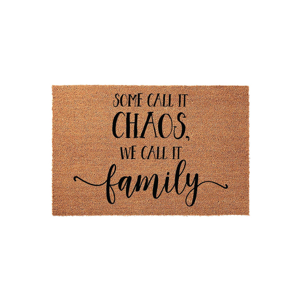 Some Call It Chaos We Call It Family Coir Doormat featuring a natural brown fiber texture with bold black lettering that reads Some Call It Chaos, We Call It Family, making a humorous and welcoming addition to any home front