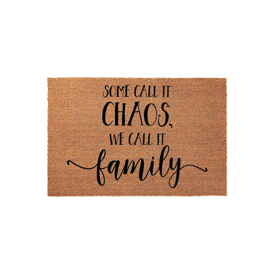 Some Call It Chaos We Call It Family Coir Doormat featuring a natural brown fiber texture with bold black lettering that reads Some Call It Chaos, We Call It Family, making a humorous and welcoming addition to any home front