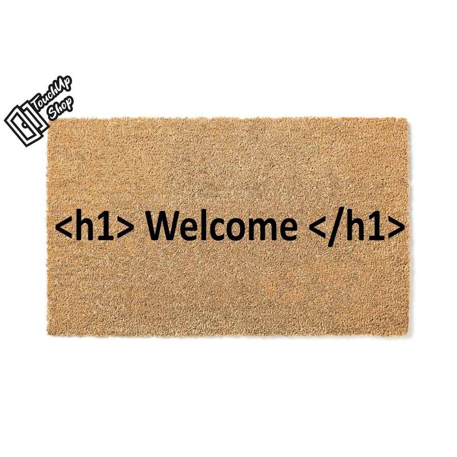 HTML Welcome Doormat featuring a natural coir fiber texture with black text that reads h1 Welcome h1 in a coding tag style, making it a fun and unique front porch decor piece for any programmer or web developer home entrance.