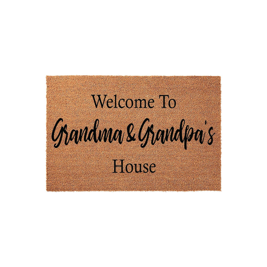 Grandma and Grandpa's House coir doormat featuring a natural tan fiber texture and bold black lettering that reads Welcome To Grandma & Grandpa's House, making a charming addition to any front porch or entryway for visiting