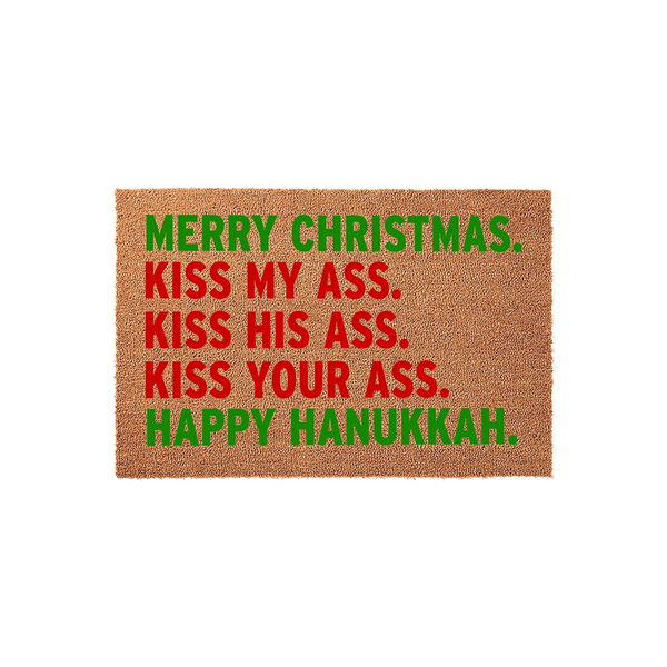Funny Christmas and Hanukkah doormat made of natural coir fiber, featuring bold red and green text that reads Merry Christmas, Kiss My Ass, Kiss His Ass, Kiss Your Ass, Happy Hanukkah against a plain white studio background.