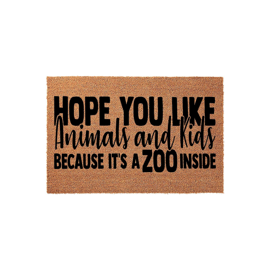 Funny Zoo Inside Doormat featuring natural coir fibers and bold black text that reads Hope You Like Animals and Kids Because It Is A Zoo Inside, making a humorous welcome mat for a busy family home with pets and children.