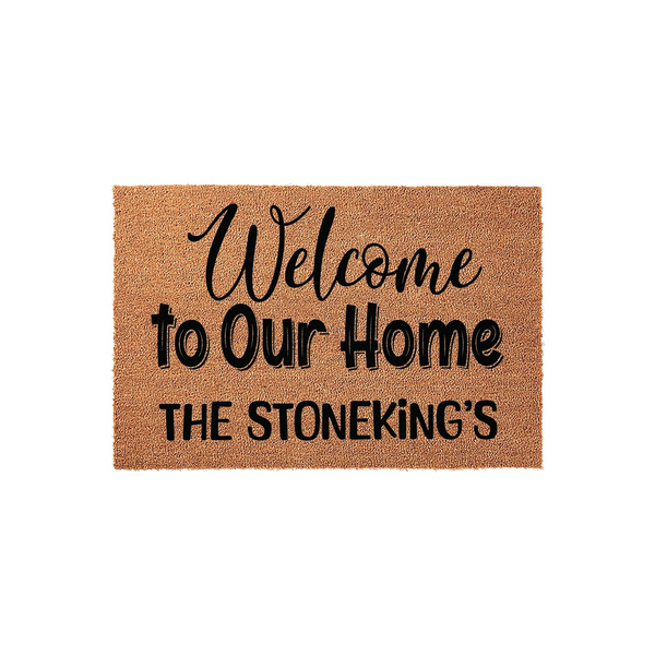 Personalized Welcome to Our Home doormat featuring a natural coir texture and bold black lettering, customized with a family name to create a warm and inviting entrance for any house or apartment front porch decor.