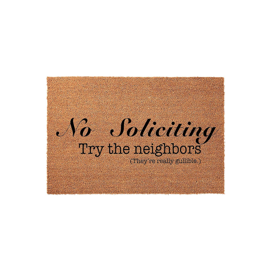 Funny No Soliciting coir doormat featuring black text that reads No Soliciting, Try the neighbors, and They are really gullible, set against a natural brown textured fiber background for a humorous front porch entryway decor