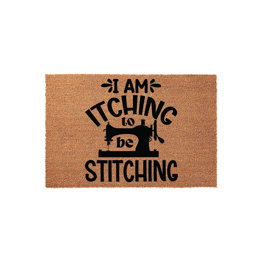 Sewing enthusiast coir doormat featuring a vintage sewing machine silhouette and the humorous text I am itching to be stitching, set against a natural tan textured fiber background for a fun craft room or entryway decor accent