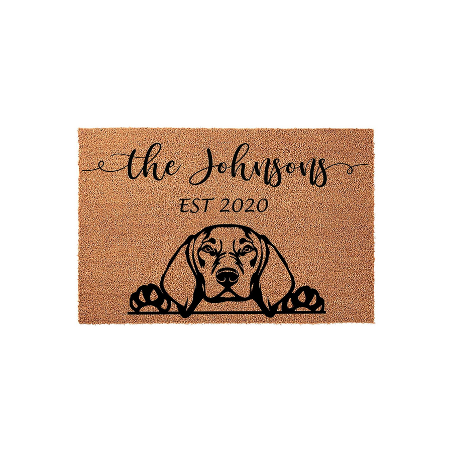 Personalized Beagle dog doormat featuring a natural coir texture with a black graphic of a Beagle peeking over the edge, customized with a family name and established year printed in elegant black script and serif fonts on a