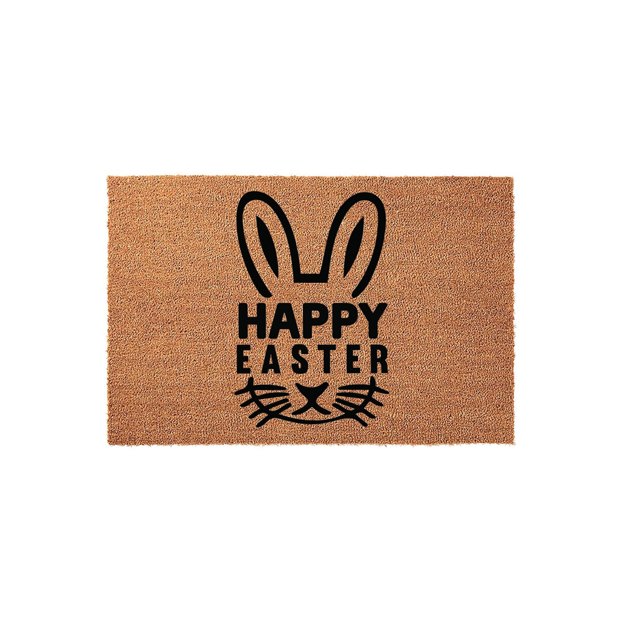 Happy Easter coir doormat featuring a minimalist black bunny face design printed on a natural brown coconut fiber mat, creating a festive spring entryway decoration for your front porch during the holiday season.