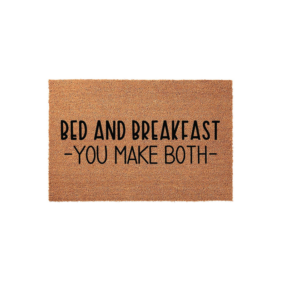 Funny Bed and Breakfast You Make Both doormat featuring natural coir fibers and bold black lettering, providing a humorous welcome for guests at your front door entrance with its witty and playful home decor message.