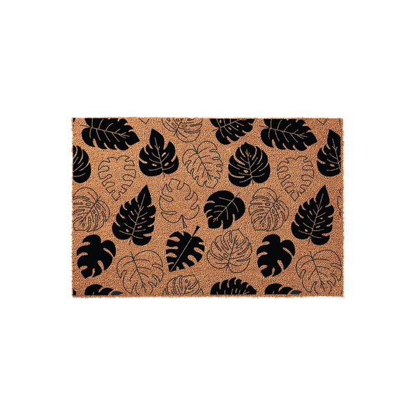 Tropical Monstera Leaf Coir Doormat featuring a natural tan fiber background with a repeating pattern of solid black and outlined monstera leaves, creating a modern botanical aesthetic for your front porch or entryway floor decor.