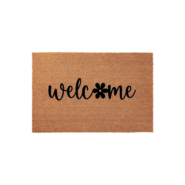 Floral Welcome Doormat featuring a natural coir fiber texture with the word welcome printed in black script, where the letter o is replaced by a simple black flower icon on a clean white studio background for a modern entryway.