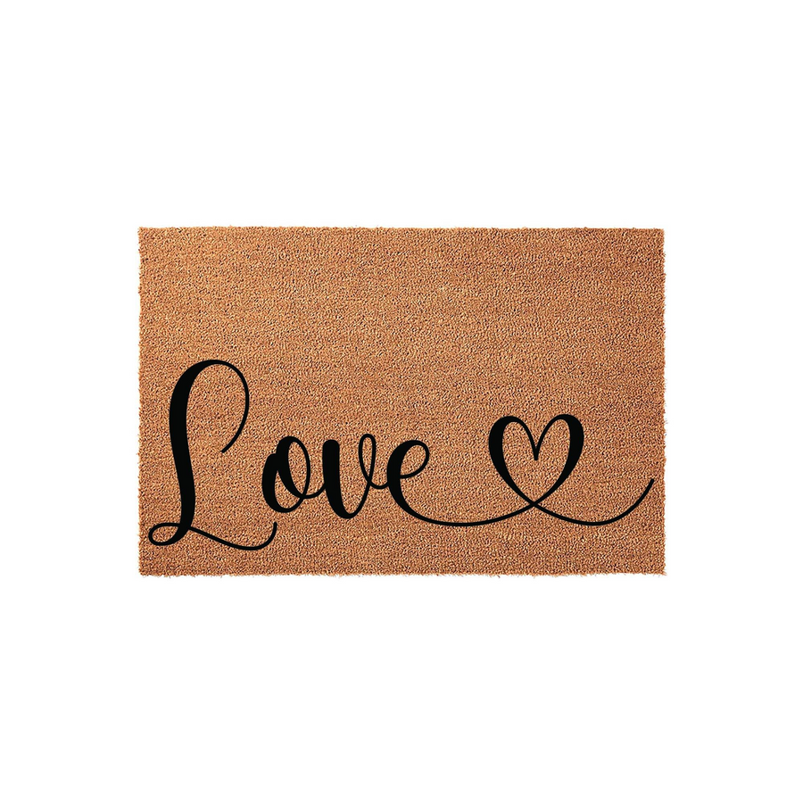 Love Script Coir Doormat featuring a natural tan fiber texture with the word Love written in elegant black cursive script, ending in a decorative heart flourish that adds a charming touch to any front porch or entryway decor.