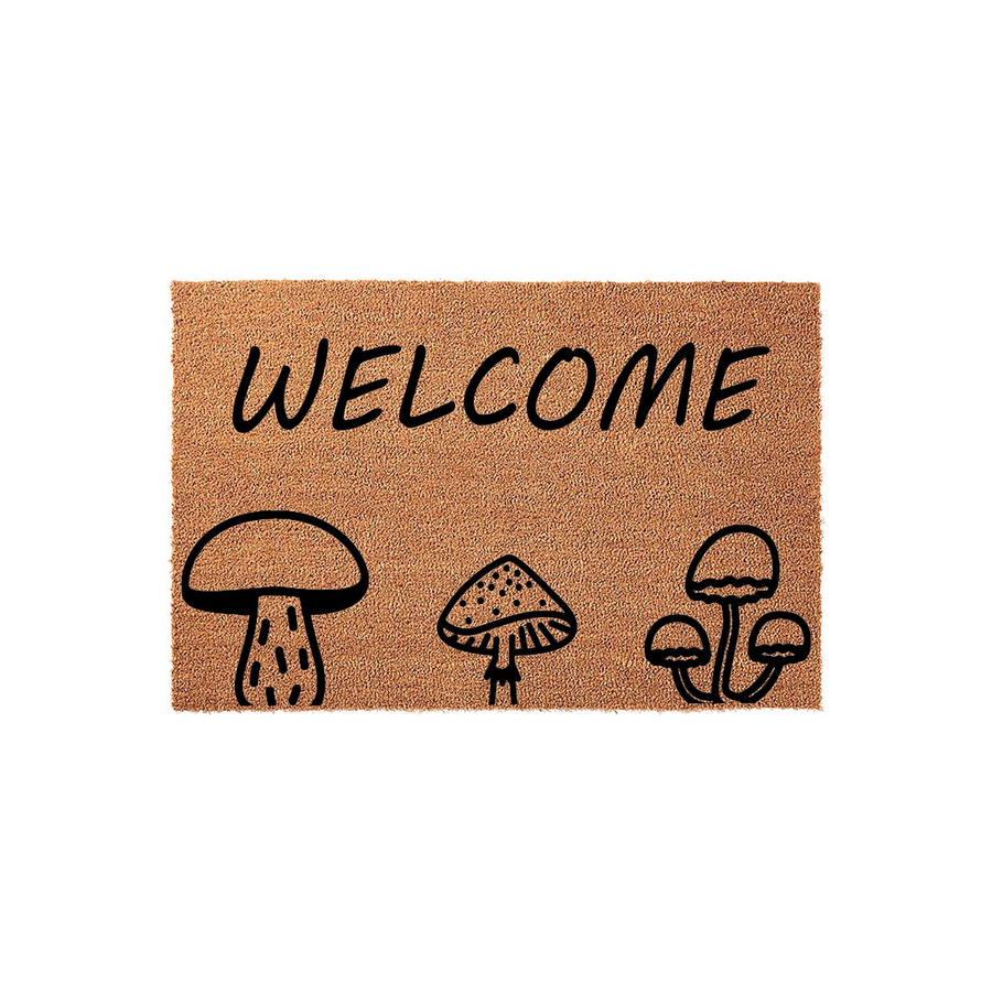 Mushroom Welcome Doormat featuring a natural coir texture with a black printed design of three distinct mushrooms and the word Welcome, creating a charming cottagecore aesthetic for your front porch or entryway decor.