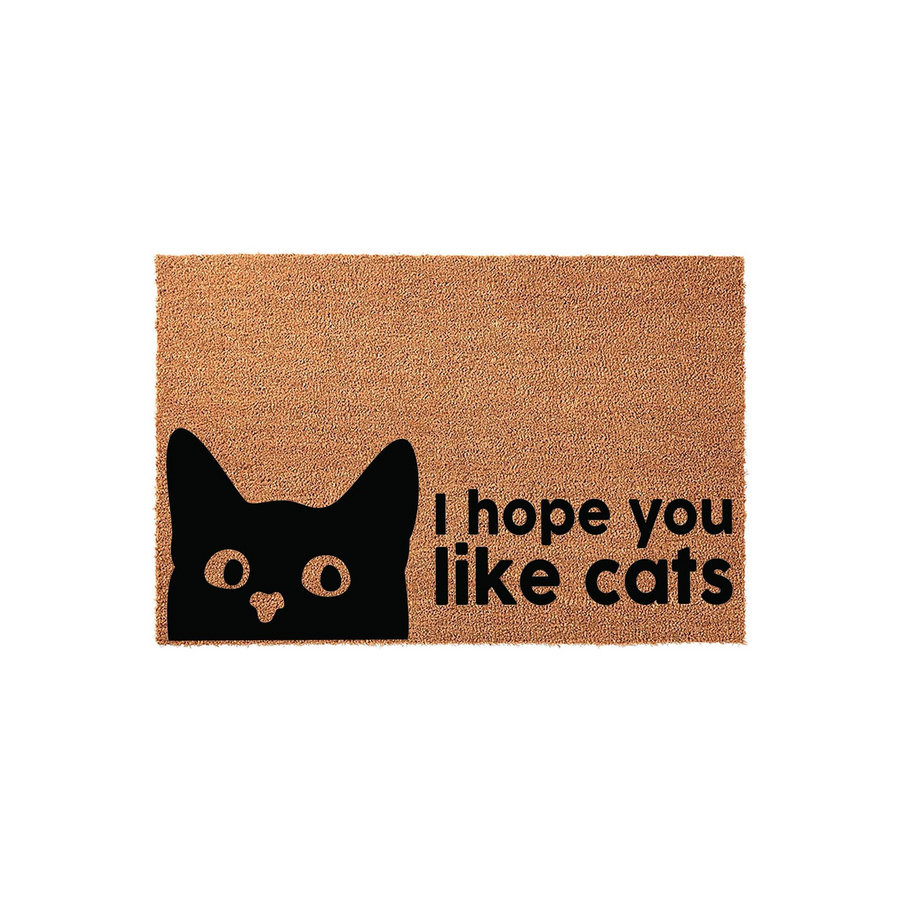 I hope you like cats coir doormat featuring a black cat silhouette peeking from the bottom left corner, set against a natural tan textured background with bold black text that reads I hope you like cats for a fun entryway decor