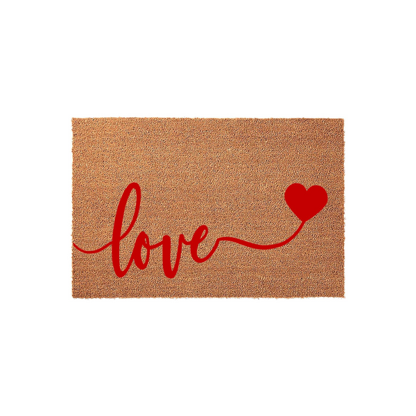 Love script coir doormat featuring a natural brown coconut fiber texture with the word love written in elegant red cursive script that extends into a decorative heart shape on the right side, set against a clean white studio