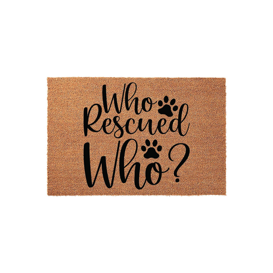 Who Rescued Who? coir doormat featuring black script lettering and paw print accents on a natural brown fiber background, making a charming entrance rug for any dog or cat lover who enjoys celebrating their adopted rescue pet at