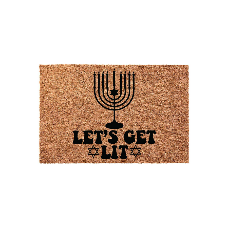 Hanukkah Menorah Doormat featuring a natural coir texture and black printed text that reads Let's Get Lit with Star of David icons, creating a festive and humorous welcome mat for the holiday season on a plain white background.