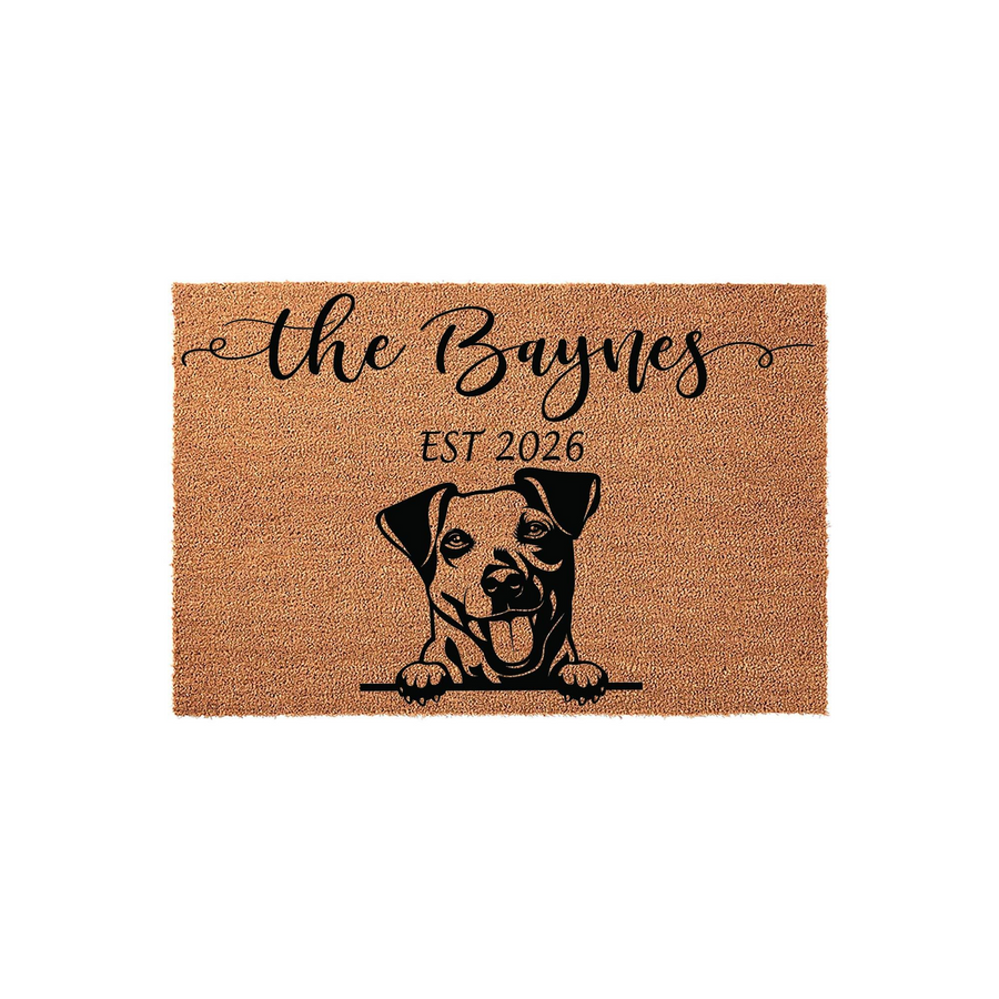 Personalized Jack Russell Terrier doormat featuring a cute dog illustration and custom family name text, crafted from natural coir fibers with a durable backing for a welcoming and charming front porch entrance decor piece.