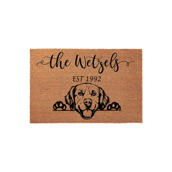 Personalized Golden Retriever doormat featuring a cute dog illustration peeking over the edge, customized with a family name and established year printed in black ink on a natural tan coir fiber mat against a clean white